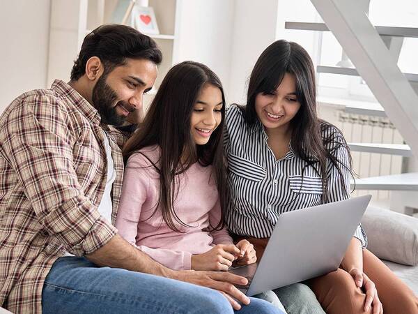 Parents go over health checklist with their college-bound teen.